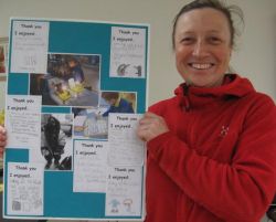 IPF UK Education Officer, Helen Turton, receives thank you card from students