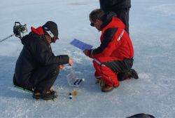 Zorigto Namsaraev (BELDIVA) and Olivier Francis (GIANT) conduct experiments on the chemical composition of the water