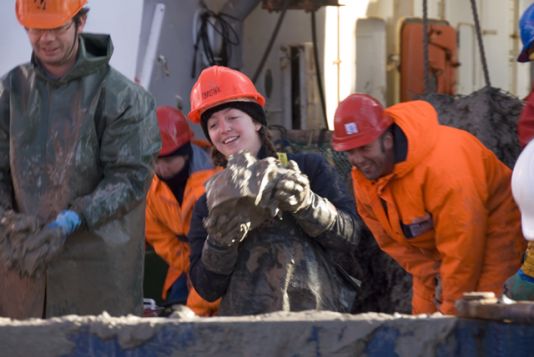 Christine, Thomas and Olaf throwing stones overboard caught by the Agassiz trawl