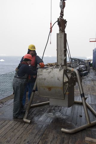 Christine McClelland from Canada ready to put her giant box corer in the water, a gear adapted to retrieve big quantities of undisturbed sediment