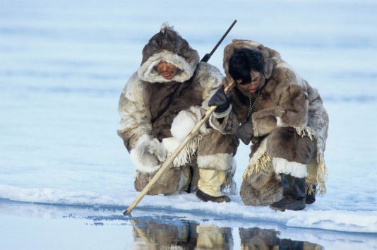 Inuit in traditional clothes from their grandparents, Baffin Island