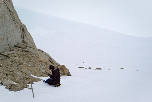 Karolien Peters takes notes after taking samples at Pinguinane