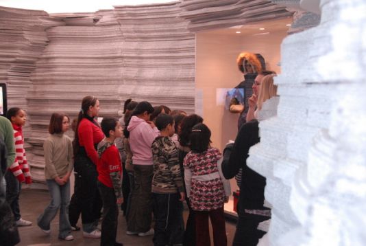 Students in the 'exploration' section of the exhibition checking out the display of expedition clothing from the 1950s and today