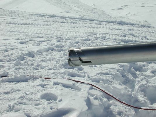 The length of the drill barrel determines the maximum length of a core sample (6 m at GISP2 and Vostok). Collection of a long core record thus requires many cycles of lowering a drill/barrel assembly, cutting a core 4-6m in length, raising the assembly to the surface, emptying the core barrel, and preparing a drill/barrel for drilling. The length of the record depends on the depth of the ice core and varies from a few years up to 800 kyr for the EPICA core. The time resolution (i.e. the shortest time period which can be accurately distinguished) depends on the amount of annual snowfall, and dminishes with depth as the ice compacts under the weight of layers accumulating on top of it. Upper layers of ice in a core corresponds to a single year or sometimes a single season. Deeper into the ice the layers thin and annual layers become indistinguishable.