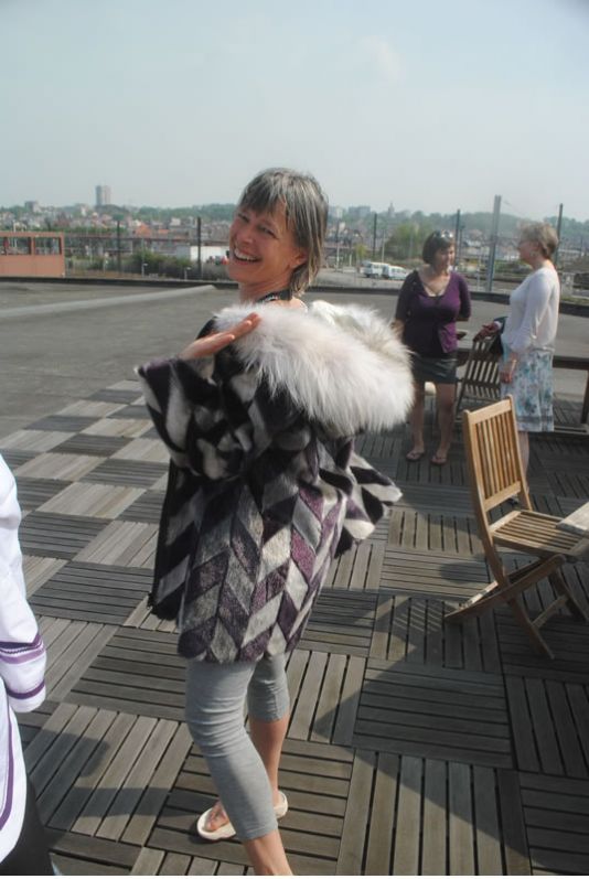 Sandra models a sealskin coat.