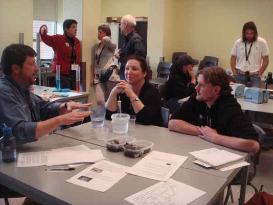 The International Polar Foundation (IPF) workshop. Teachers discussing the different experiments.