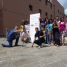 Carlo Ossola (1st left, coordinator of the summer school), and Matteo Cattadori (2nd left, coordinator of the educational activities), performing the SunShadows experiment with the teachers.